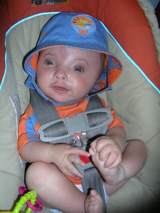 CJ hanging out in his car seat.